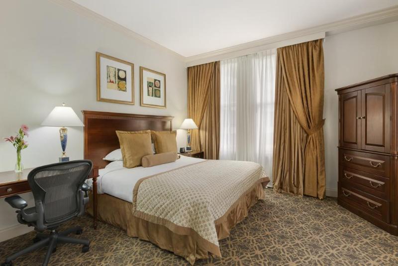 The Whitney Hotel New Orleans Room photo